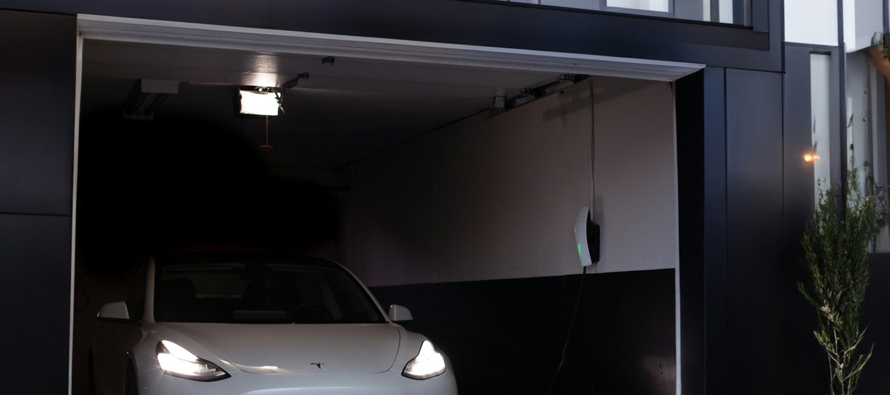 Home energy equipment installed inside a clean garage