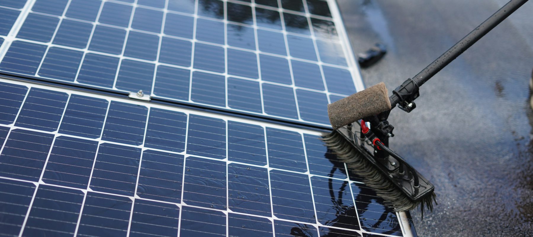 Solar panels being cleaned and maintained