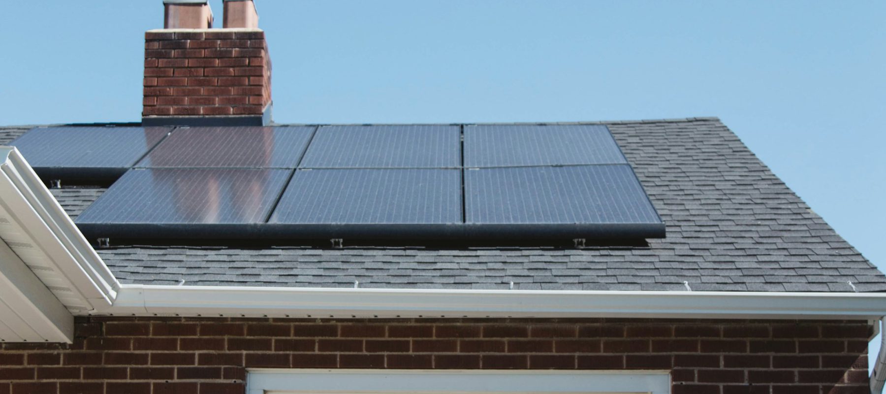 Residential roof covered with solar panels